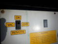 A panel with labeled buttons for ON VAC OFF and REMOTE on a control box