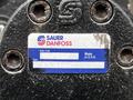 A close-up of a 2007 Tennant Sentinel label featuring the Sauer Danfoss logo with details including date code and type information