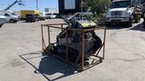 A 2024 Agt Ktt23 Stand On Skid Steer Track Loader 23HP with tracks and a control panel mounted on top placed on a metal frame