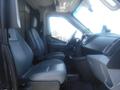 Interior of a 2016 Ford Transit with two front seats and dashboard visible