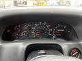 Dashboard of a 2008 Ford F-750 showing speedometer tachometer fuel gauge and other indicator lights