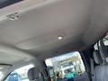 Interior view of a 2019 Ford F-350 SD showing the ceiling and front seats with a dome light and headliner detail