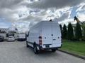 A 2017 Mercedes-Benz Sprinter van in white with a high roof and rear doors facing the viewer