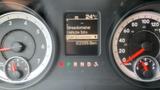 Dashboard of a 2013 RAM 2500 showing speedometer and vehicle information display with fuel economy and odometer readings