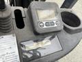 Close-up of the control panel of a 2011 Toyota Forklift showing digital display and various buttons for operation