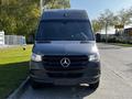 A 2021 Mercedes-Benz Sprinter van with a sleek design and a prominent Mercedes star logo on the front grille
