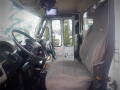 Interior of a 2008 International 7400 with a driver's seat and steering wheel visible