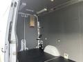 Interior of a 2017 Mercedes-Benz Sprinter van showing a spacious cargo area with a flat floor and gray walls