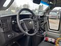 Interior view of a 2017 Chevrolet Express showing the steering wheel dashboard and control panel