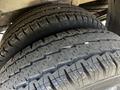 A close-up view of two tires from a 2022 Mercedes-Benz Sprinter showing detailed tread patterns and textures