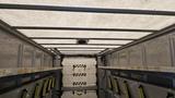 Interior view of a 2006 Ford Econoline showing the ceiling and metal framework inside the cargo area with support beams and hooks on the sidewalls