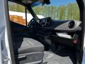 Interior view of a 2022 Mercedes-Benz Sprinter showing the driver's seat dashboard and controls