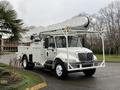 A white 2007 International 4200 truck equipped with a tall hydraulic lift and a utility bed for maintenance and repair work