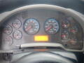 Dashboard of a 2008 International 7400 with various gauges including RPM speed fuel and voltage indicators along with warning lights