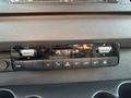 Dashboard controls of a 2019 Mercedes-Benz Sprinter featuring climate control settings and air conditioning buttons