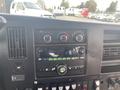 Dashboard of a 2017 Chevrolet Express featuring controls for air conditioning audio system and multiple buttons for various functions