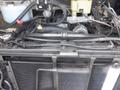 Engine components of a 2007 Morgan Olson Workhorse W42 including radiator hoses wires and cooling system parts