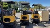 Three yellow 2021 Cael-1T Mini excavators lined up in a row with canopies and tracks visible