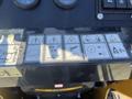 Control panel of a 2024 AGT KTT23 Mini Skid Steer featuring various safety and operation icons