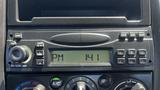 Dashboard of a 2006 Ford LCF 550 showing the radio and climate control dials with a digital clock displaying 14:41