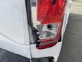 A damaged rear taillight of a 2017 Ford F-150 with a broken lens and visible scratches on the surrounding surface