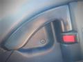 Close up of the door handle and lock mechanism of a 2013 Mitsubishi Fuso FE 160