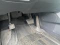 The image shows the floor area of a 2017 Hyundai Santa Fe featuring the accelerator and brake pedals along with a rubber floor mat