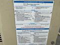 A control panel with instructions for a 2000 Wilkerson Refrigerated Air Dryer and Ingersoll-Rand Air Compressor detailing installation and maintenance procedures