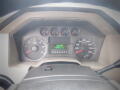 Dashboard of a 2008 Ford F-550 showing speedometer tachometer and odometer with a digital display