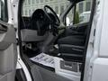 Interior view of a 2017 Mercedes-Benz Sprinter with a driver's seat and dashboard visible including steering wheel and controls