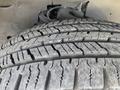 Close-up of a tire tread on a 2017 Chevrolet Express showing detailed patterns and grooves designed for traction and grip