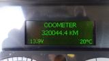 Odometer display showing a reading of 320044.4 KM with battery voltage at 13.9V and temperature at 20°C