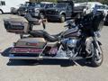 2004 Harley-Davidson Flhtcui motorcycle with chrome accents saddle bags and a touring seat