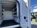 The image shows the open rear of a 2019 Ford F-350 SD featuring a cargo area with metal shelving on both sides and a rubberized floor
