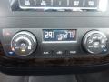 2008 Cadillac Limousine dashboard climate control panel featuring temperature displays and adjustment knobs