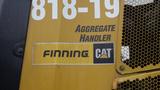 2019 Caterpillar 972M XE featuring an aggregate handler logo with branding for Finning and CAT