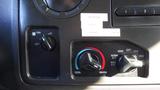 Controls for the heating and air conditioning system in a 2015 Ford Econoline including fan speed and temperature settings