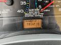 Dashboard of a 2007 International 4300 displaying odometer reading of 793216 km and gear indicators PRND with speedometer and other gauges in the background