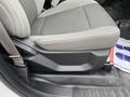 A 2017 Ford F-150 front seat with gray fabric upholstery showing the seat cushion and armrest