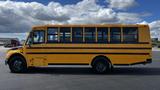 2014 Freightliner Thomas Diesel School Bus with a yellow exterior and black accents featuring large windows and wheels