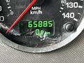 Close-up of a vehicle speedometer displaying a mileage reading of 65885 km with a scale marked in both miles per hour and kilometers per hour