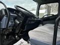Interior view of a 2006 Hino 268 showing the steering wheel dashboard and driver's seat