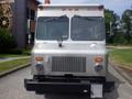 Silver 2007 Morgan Olson Workhorse W42 delivery truck with a flat front and large windshield featuring two wipers and a spotlight mounted on the hood