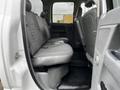 Interior view of a 2008 Dodge Ram 5500 showing gray upholstered rear seats and a clean floor space