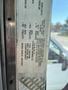 2011 Ford Econoline vehicle details sticker displaying specifications and unit information