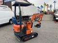 A compact orange and gray excavator with a small arm and bucket attached, designed for digging and excavation tasks, featuring tracks for mobility and a covered operator seat