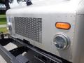 Front view of a 2007 Morgan Olson Workhorse W42 featuring a metallic grille amber turn signal and round headlights