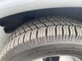 Close-up of a tire from a 2017 Chevrolet Express showing tread patterns and sidewall details