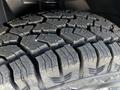 Close-up view of a textured tire on a 2022 Mercedes-Benz Sprinter showing deep treads designed for traction and durability