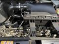 The engine compartment of a 2019 Mercedes-Benz Sprinter showing various components including the air intake and visible tubing